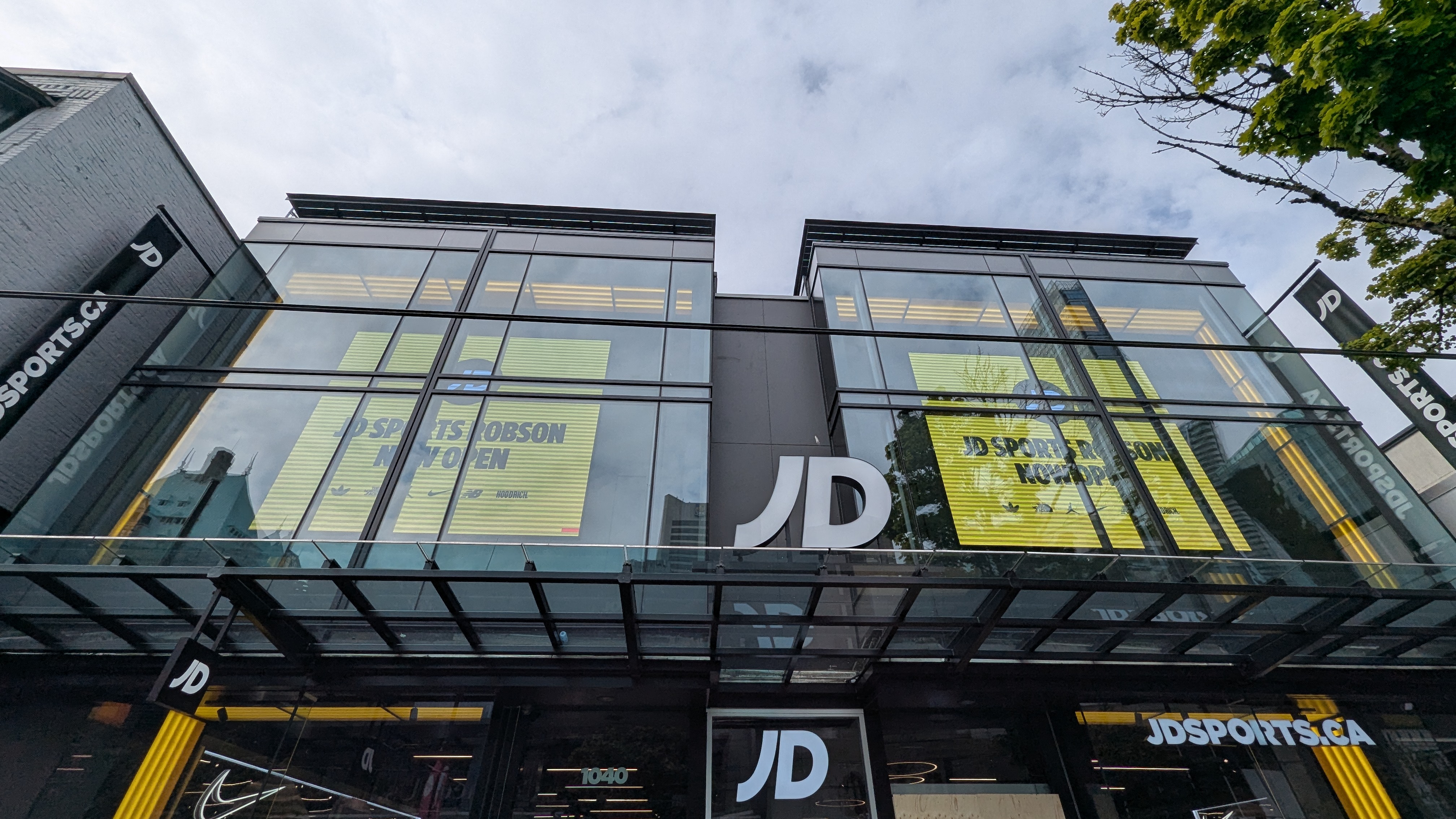 JD Sports store interior with large LED displays